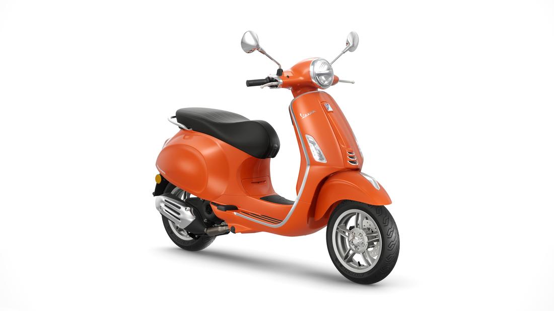 Vespa Primavera 50 orange, 3 quarts face droit