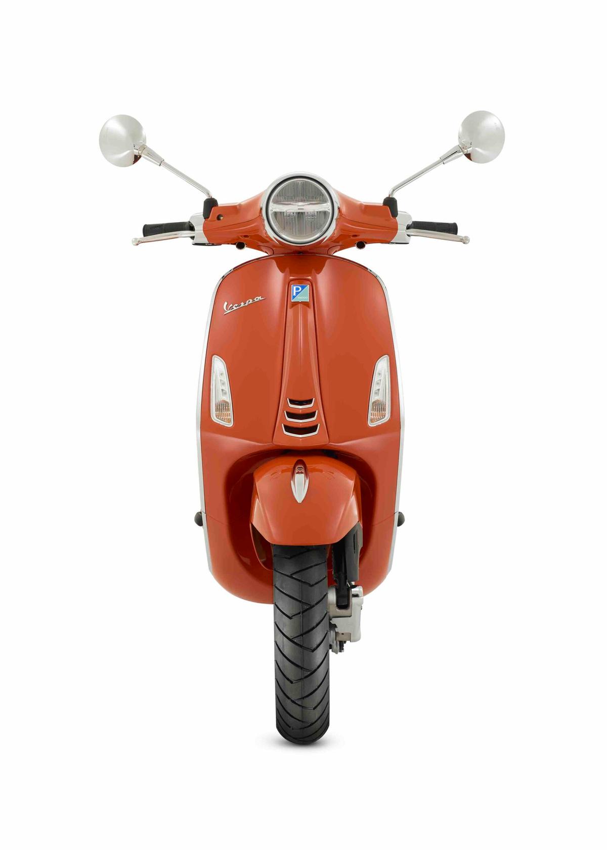 Vespa Primavera 125 orange de face